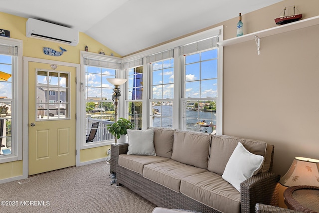 118 S Binnacle Dr, Little Egg Harbor, NJ 08087 - carpeted living room with a wall unit AC, a water view, vaulted ceiling, and healthy amount of natural light