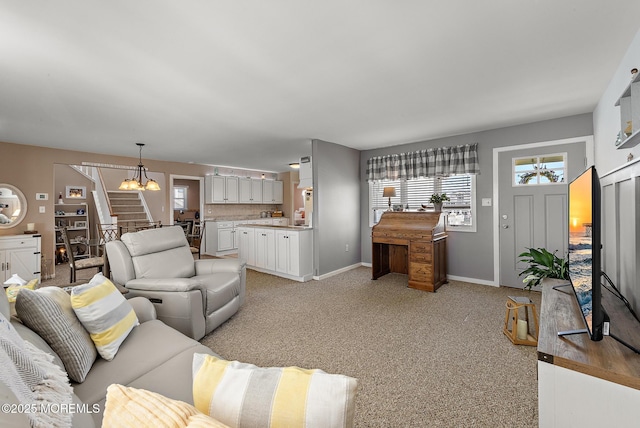 118 S Binnacle Dr, Little Egg Harbor, NJ 08087 - living area featuring stairs, a chandelier, and light carpet