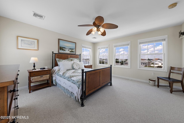 118 S Binnacle Dr, Little Egg Harbor, NJ 08087 - bedroom with light carpet, multiple windows, and a ceiling fan