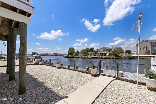118 S Binnacle Dr, Little Egg Harbor, NJ 08087 - dock featuring a gate, a water view, and a residential view