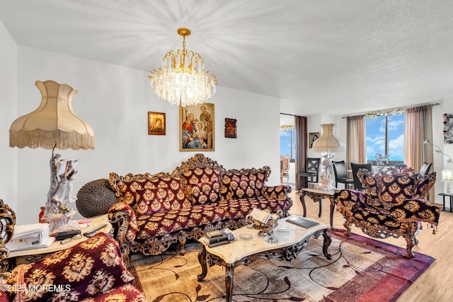 2508 Harmon Cv, Secaucus, NJ 07094 - living room with a chandelier, wood finished floors, and a textured ceiling
