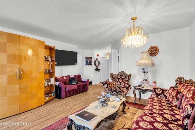 2508 Harmon Cv, Secaucus, NJ 07094 - living area featuring a chandelier and wood finished floors