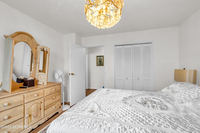 2508 Harmon Cv, Secaucus, NJ 07094 - bedroom featuring a chandelier and a closet