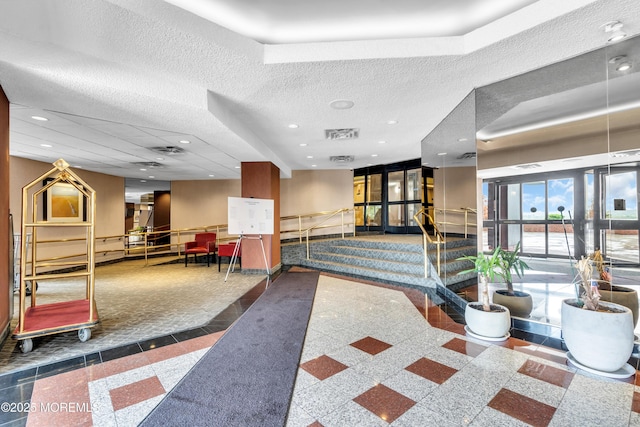 2508 Harmon Cv, Secaucus, NJ 07094 - building lobby featuring a textured ceiling and recessed lighting