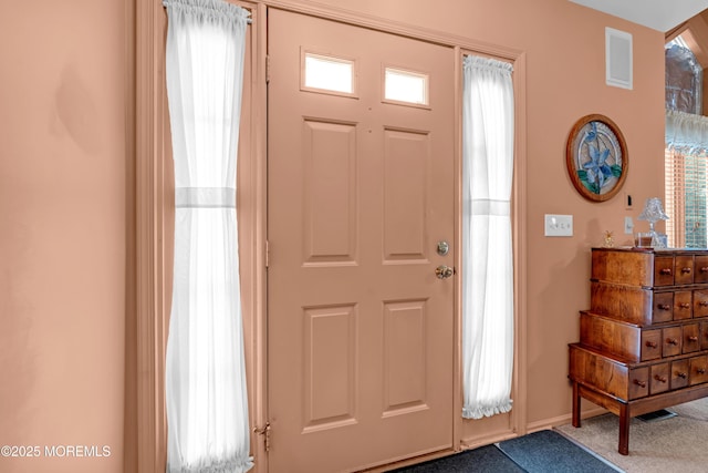 13 Heritage Dr, Howell, NJ 07731 - foyer entrance with carpet flooring and baseboards