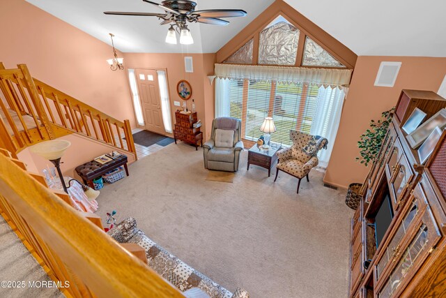 13 Heritage Dr, Howell, NJ 07731 - carpeted living area with stairs, ceiling fan, and vaulted ceiling