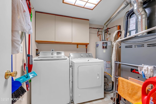13 Heritage Dr, Howell, NJ 07731 - laundry room with washer and clothes dryer, water heater, and cabinet space