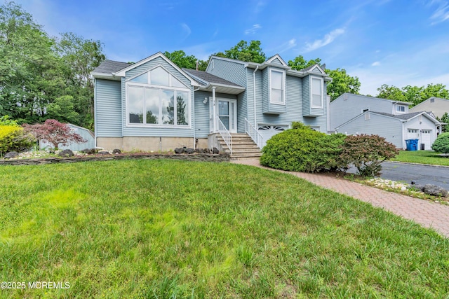 13 Heritage Dr, Howell, NJ 07731 - tri-level home featuring a front yard