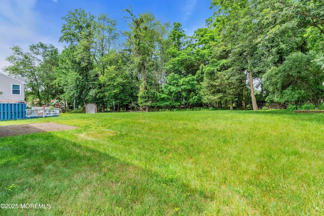13 Heritage Dr, Howell, NJ 07731 - view of green lawn with a storage unit