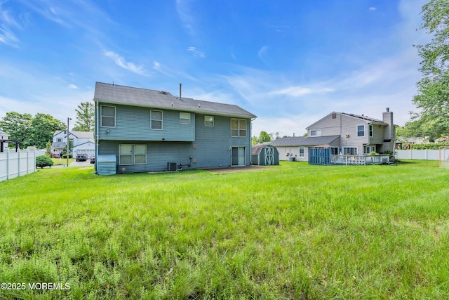 13 Heritage Dr, Howell, NJ 07731 - back of house with a storage shed