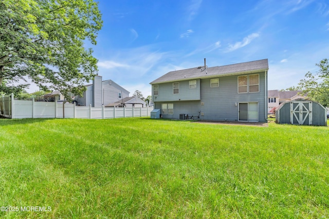 13 Heritage Dr, Howell, NJ 07731 - rear view of property with a shed