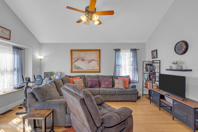 1506 Beverly Rd, Forked River, NJ 08731 - living room featuring high vaulted ceiling, a ceiling fan, and light wood finished floors