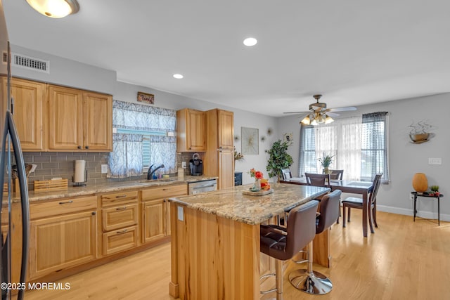 1506 Beverly Rd, Forked River, NJ 08731 - kitchen featuring healthy amount of natural light, backsplash, a center island, and recessed lighting