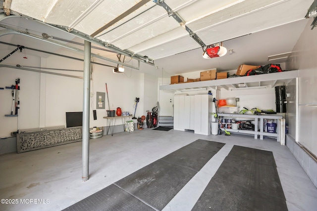 96 Kentucky Way, Freehold, NJ 07728 - garage featuring a garage door opener and electric panel