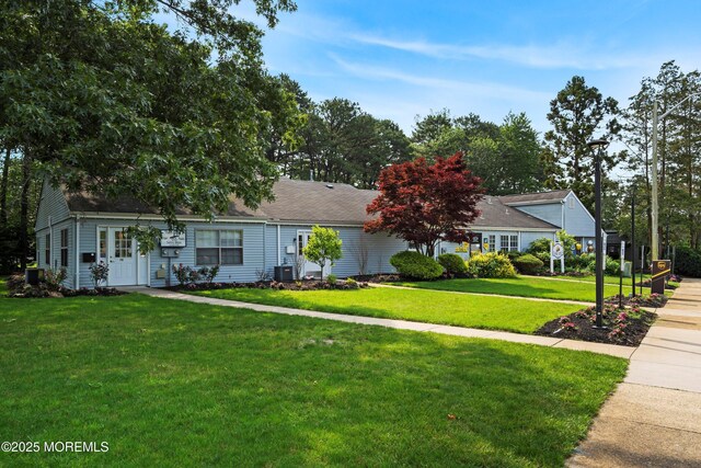 603-B Bosworth Ct, Manchester, NJ 08759 - view of front of house featuring a front lawn and a shingled roof