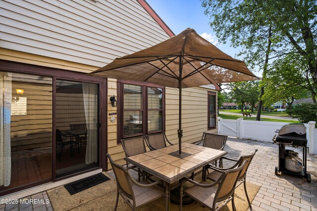 603-B Bosworth Ct, Manchester, NJ 08759 - view of patio with outdoor dining area and a grill