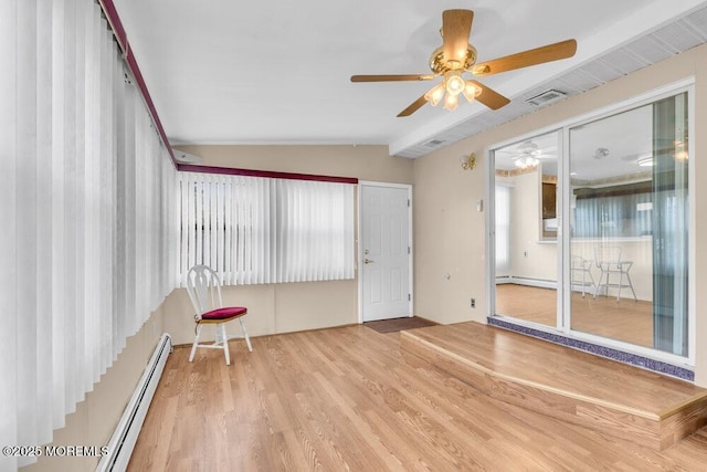 68 Barbados Dr S, Toms River, NJ 08757 - spare room featuring lofted ceiling, ceiling fan, a baseboard radiator, wood finished floors, and baseboard heating