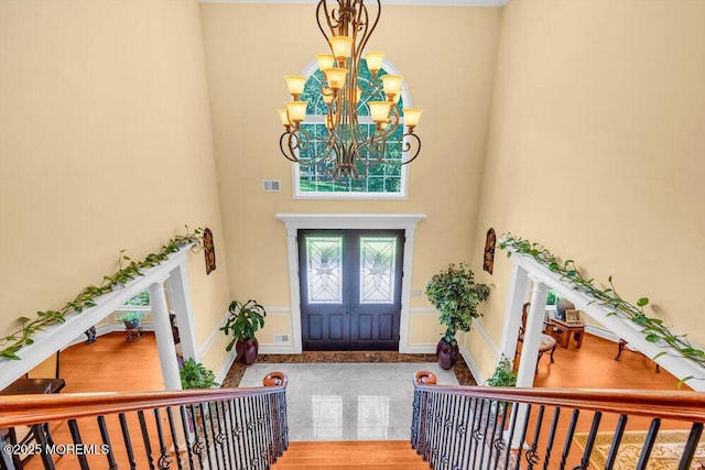 312 Clearstream Rd, Jackson, NJ 08527 - entryway featuring a chandelier, a towering ceiling, and a decorative wall