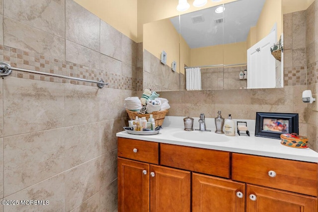 312 Clearstream Rd, Jackson, NJ 08527 - full bath featuring vanity, decorative backsplash, curtained shower, and tile walls