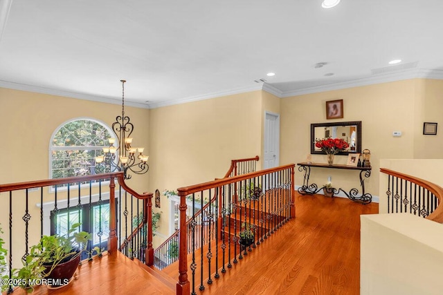 312 Clearstream Rd, Jackson, NJ 08527 - hall featuring an upstairs landing, a chandelier, wood finished floors, recessed lighting, and ornamental molding