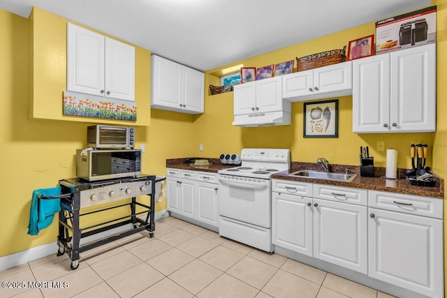 312 Clearstream Rd, Jackson, NJ 08527 - kitchen with electric stove, under cabinet range hood, dark countertops, and white cabinets