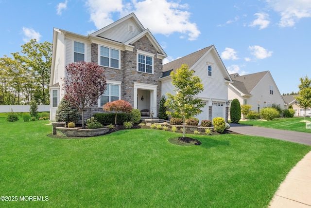23 Interlachen Ct, Monroe, NJ 08831 - view of front of house with stone siding and asphalt driveway