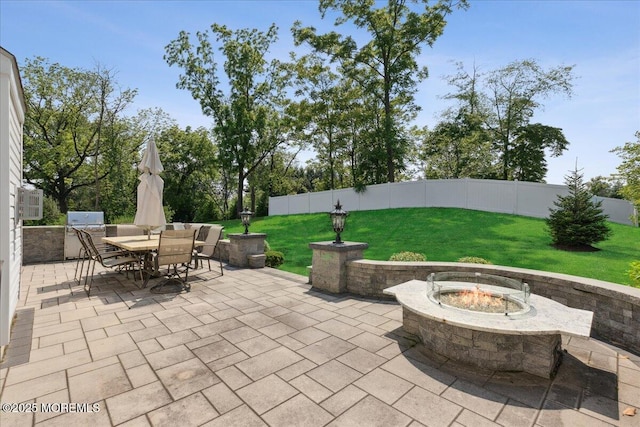 23 Interlachen Ct, Monroe, NJ 08831 - fenced backyard featuring a patio area, outdoor dining space, a fire pit, and area for grilling