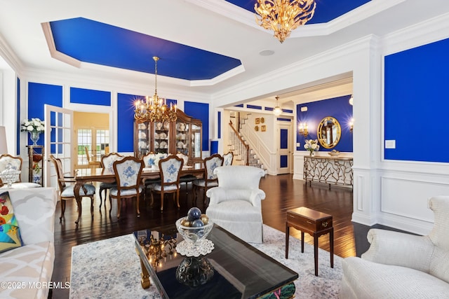 23 Interlachen Ct, Monroe, NJ 08831 - living room with a chandelier, a tray ceiling, wood-type flooring, ornamental molding, and stairs