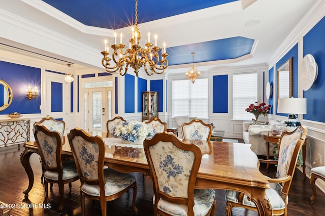 23 Interlachen Ct, Monroe, NJ 08831 - dining room featuring a decorative wall, a chandelier, crown molding, wood-type flooring, and a wainscoted wall