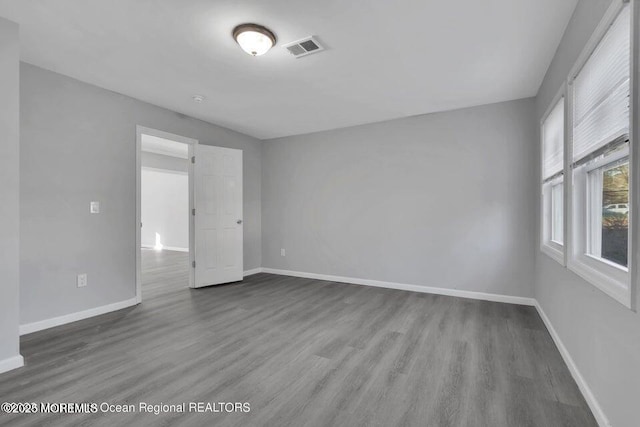 58 Chadwick Ave, Toms River, NJ 08753 - unfurnished room featuring wood finished floors and baseboards