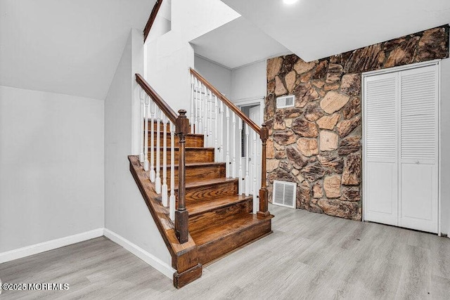 58 Chadwick Ave, Toms River, NJ 08753 - stairs featuring wood finished floors and baseboards