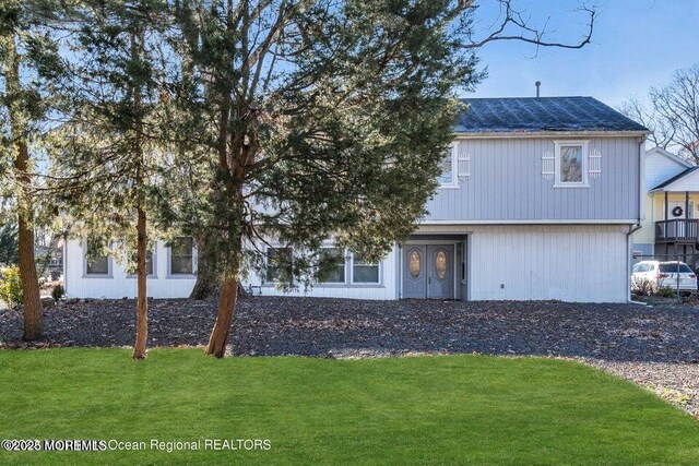 58 Chadwick Ave, Toms River, NJ 08753 - view of front facade featuring a front lawn and a shingled roof