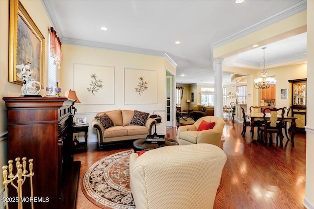 86 Wild Dunes Way, Jackson, NJ 08527 - living room with decorative columns, a chandelier, wood finished floors, crown molding, and recessed lighting