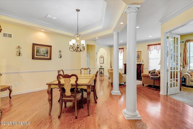 86 Wild Dunes Way, Jackson, NJ 08527 - dining area featuring decorative columns, ornamental molding, and light wood-type flooring