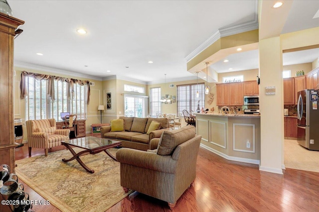 86 Wild Dunes Way, Jackson, NJ 08527 - living room with light wood-type flooring, ornamental molding, and recessed lighting