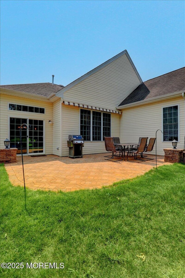86 Wild Dunes Way, Jackson, NJ 08527 - rear view of property featuring a patio area and a yard