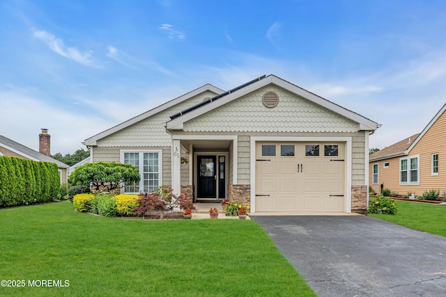 61 Mansfield Ave, Manchester, NJ 08759 - view of front of house with driveway, a front lawn, and stone siding
