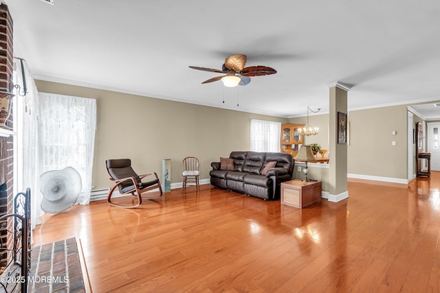 61 Mansfield Ave, Manchester, NJ 08759 - living room featuring ceiling fan, crown molding, a chandelier, and wood finished floors