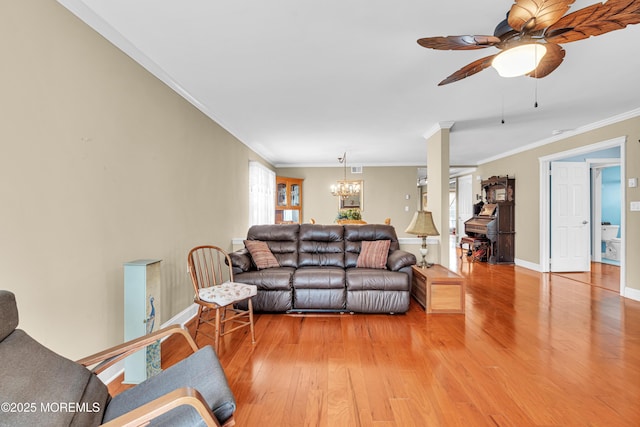 61 Mansfield Ave, Manchester, NJ 08759 - living room with light wood-type flooring, a chandelier, ceiling fan, and crown molding