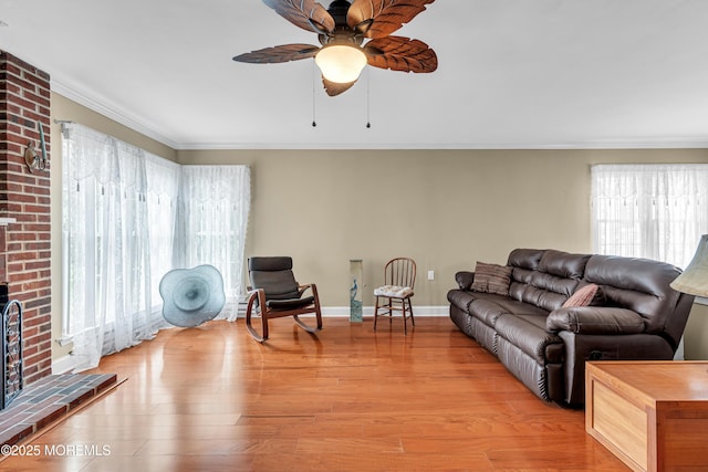 61 Mansfield Ave, Manchester, NJ 08759 - living room with ceiling fan, healthy amount of natural light, ornamental molding, and light wood-type flooring