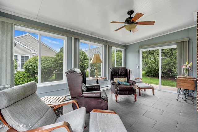 61 Mansfield Ave, Manchester, NJ 08759 - sunroom / solarium with a baseboard radiator, lofted ceiling, and crown molding