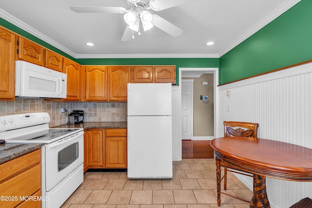61 Mansfield Ave, Manchester, NJ 08759 - kitchen with white appliances, ornamental molding, light tile patterned flooring, decorative backsplash, and a ceiling fan