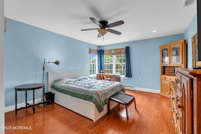 61 Mansfield Ave, Manchester, NJ 08759 - bedroom with baseboard heating, light wood finished floors, recessed lighting, and a ceiling fan