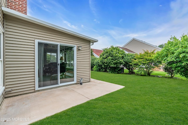 61 Mansfield Ave, Manchester, NJ 08759 - view of grassy yard with a patio area