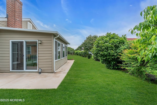61 Mansfield Ave, Manchester, NJ 08759 - view of green lawn with a patio area