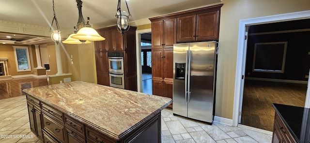 7 Quaker Hill Rd, Jackson, NJ 08527 - kitchen featuring stainless steel appliances, ornate columns, open floor plan, decorative light fixtures, and a kitchen island