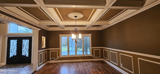 7 Quaker Hill Rd, Jackson, NJ 08527 - entryway with a chandelier, french doors, plenty of natural light, coffered ceiling, and wainscoting