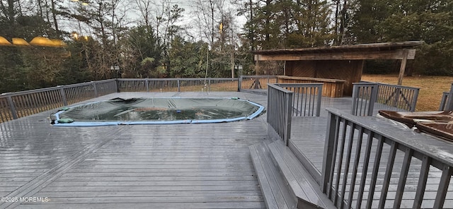 7 Quaker Hill Rd, Jackson, NJ 08527 - view of pool featuring a wooden deck, a covered pool, and view of scattered trees