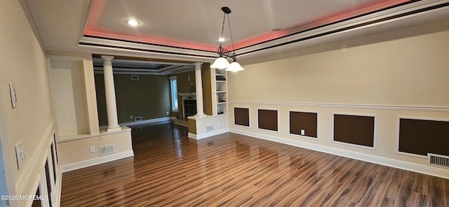 7 Quaker Hill Rd, Jackson, NJ 08527 - unfurnished room with ornate columns, a raised ceiling, dark wood-style flooring, ornamental molding, and recessed lighting