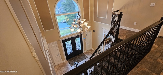 7 Quaker Hill Rd, Jackson, NJ 08527 - foyer entrance featuring stairway, a chandelier, and stone finish floors